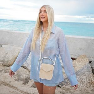 12th Tribe light sheer blue button up shirt. Size Large.